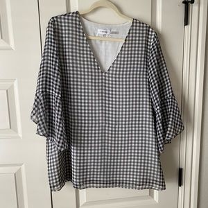 Black and white checkered blouse